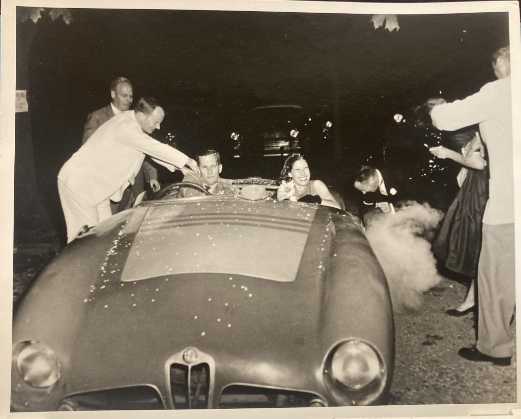 Wedding Picture, 22 September 1957, Nancy H. Wessells and Henry W. Wessells III, and well wishers. The Alfa Romeo Disco Volante was painted Swedish blue with yellow hood panel